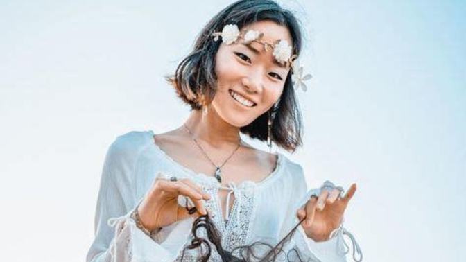Do Asian people ever have naturally curly hair?