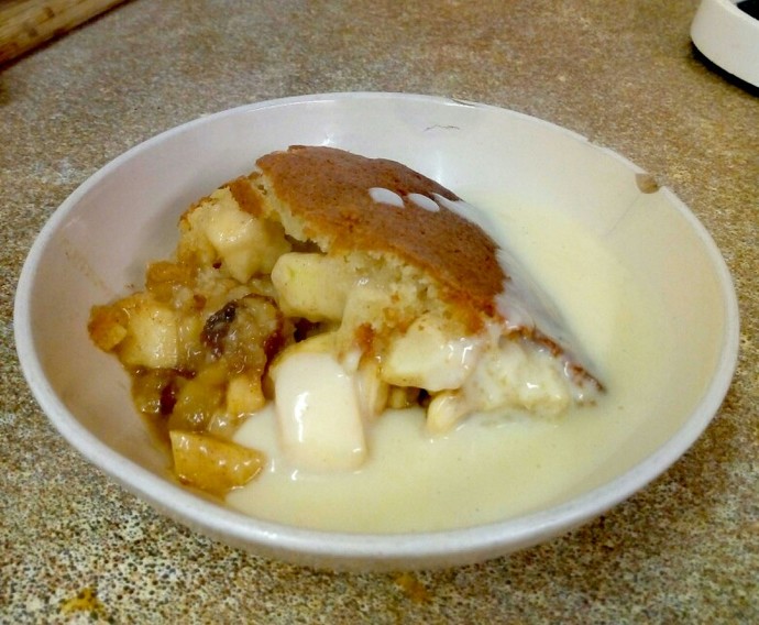 When having a pudding where should the custard go?