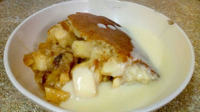 When having a pudding where should the custard go?