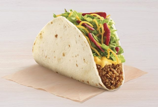 You get a million dollars if you can eat this single stuffed taco without dropping a single piece of food out of it one hand. Think you could succeed?