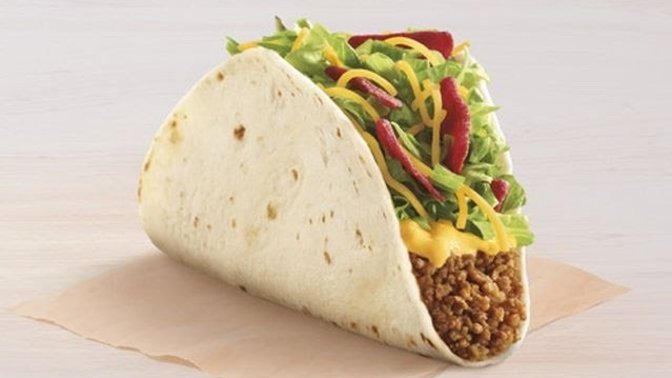 You get a million dollars if you can eat this single stuffed taco without dropping a single piece of food out of it one hand. Think you could succeed?