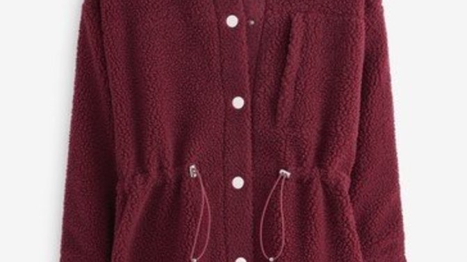 What color of this coat do you think is better for pale skin and platinum hair?