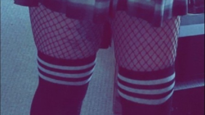 Do you like the combo of skirts, knee high, and fishnets?