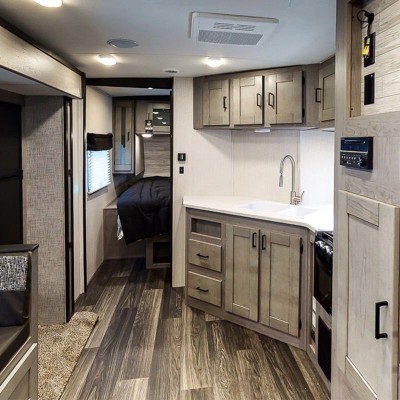 Tiny house vs a Camper: which would you live in if you had to choose between the two?