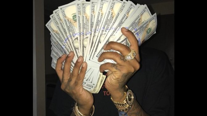 Why do Black Men flex their money?