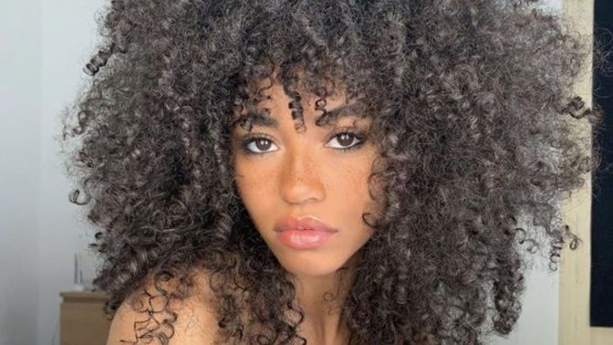 Guys, do you seriously find girls with curly hair (photos below) unattractive?