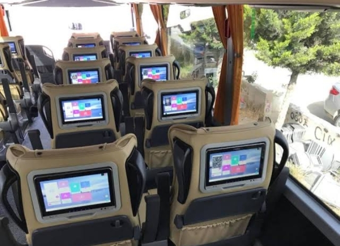 How are the seats, how comfortable are the seats, and is there a mini TV behind the seats on the buses that make intercity trips in America?