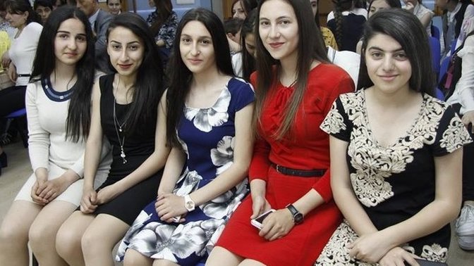 Which country's girls are friendlier and more open?