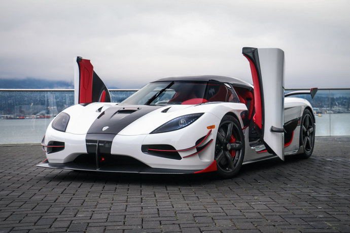 Which of these cars with unique doors is your favorite?