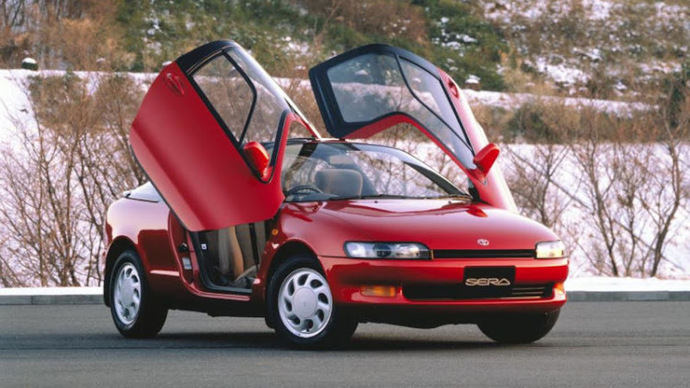 Which of these cars with unique doors is your favorite?