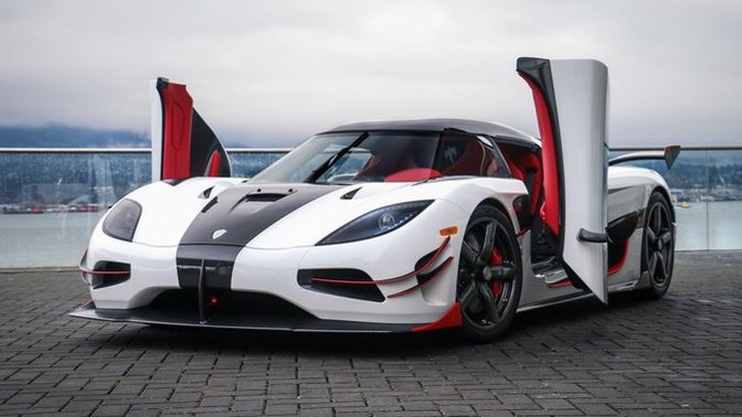 Which of these cars with unique doors is your favorite?