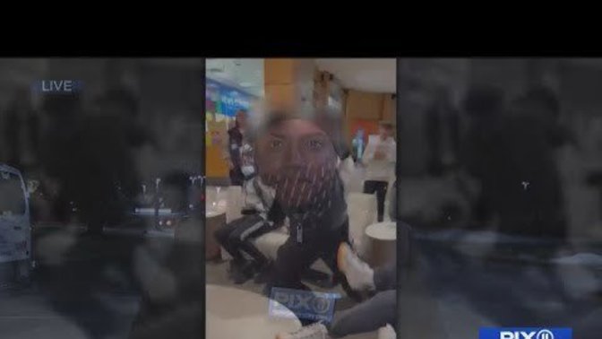 Why was the Caucasian male treated with "kid gloves" while the other Black Male was roughed up?