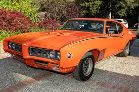 Then old school raw muscle, the 1969 GTO Judge. Orange seems to fit this car best.