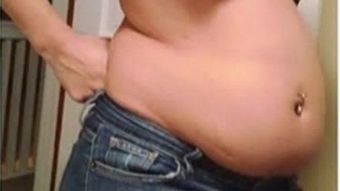 Girls, My girlfriend thinks she's fat how do I get her to understand she is not?