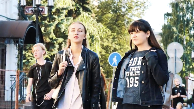 Which girl has a better outfit in your opinion? The girl wearing leather jacket and leather pants, or girl wearing jeans and jean jacket?