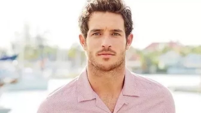 Can a guy still be masculine while wearing pink? Girls, do you find a man wearing a pink shirt attractive?