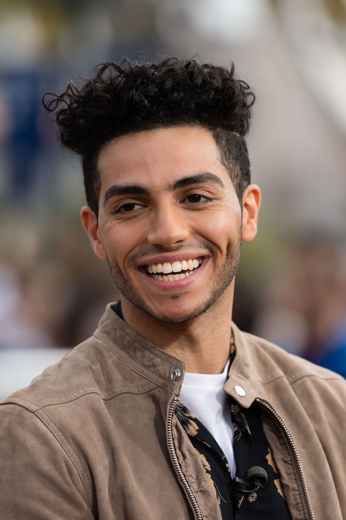 Does this guy look black or mix with it?