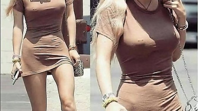 Does this girl have a nipple piercing?