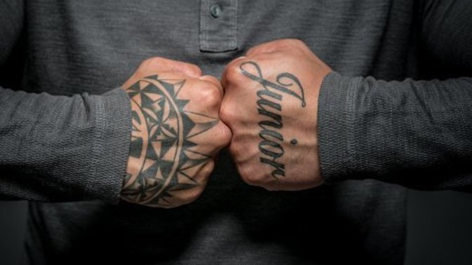 Why are some women so attracted to arggresive/dangerous looking guys with tattoos?