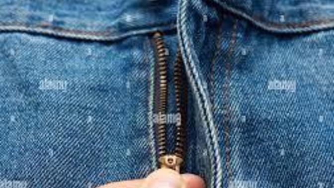 Guys: Do you pee through the fly or over the top of your pants?