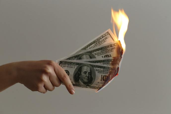 Should I buy a used car cash or finance a new car?