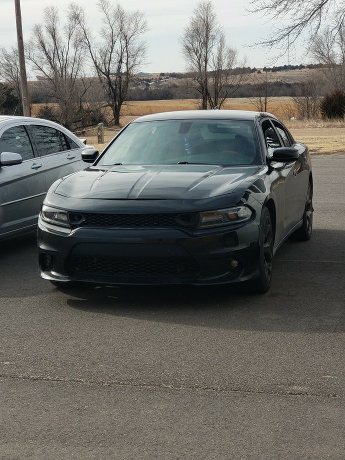 Should I buy a used car cash or finance a new car?