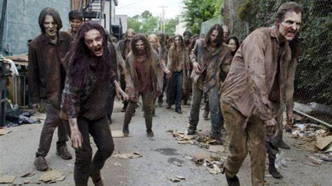 Why do zombies, post-George Romero, always wear plaid shirts, gray-colored clothes, and have perfect teeth?