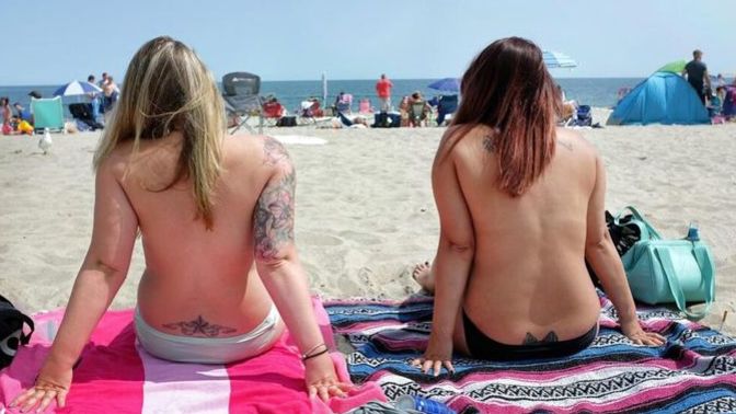 Girls, do you mind guys staring when you go topless at the beach? Guys, do you stare?