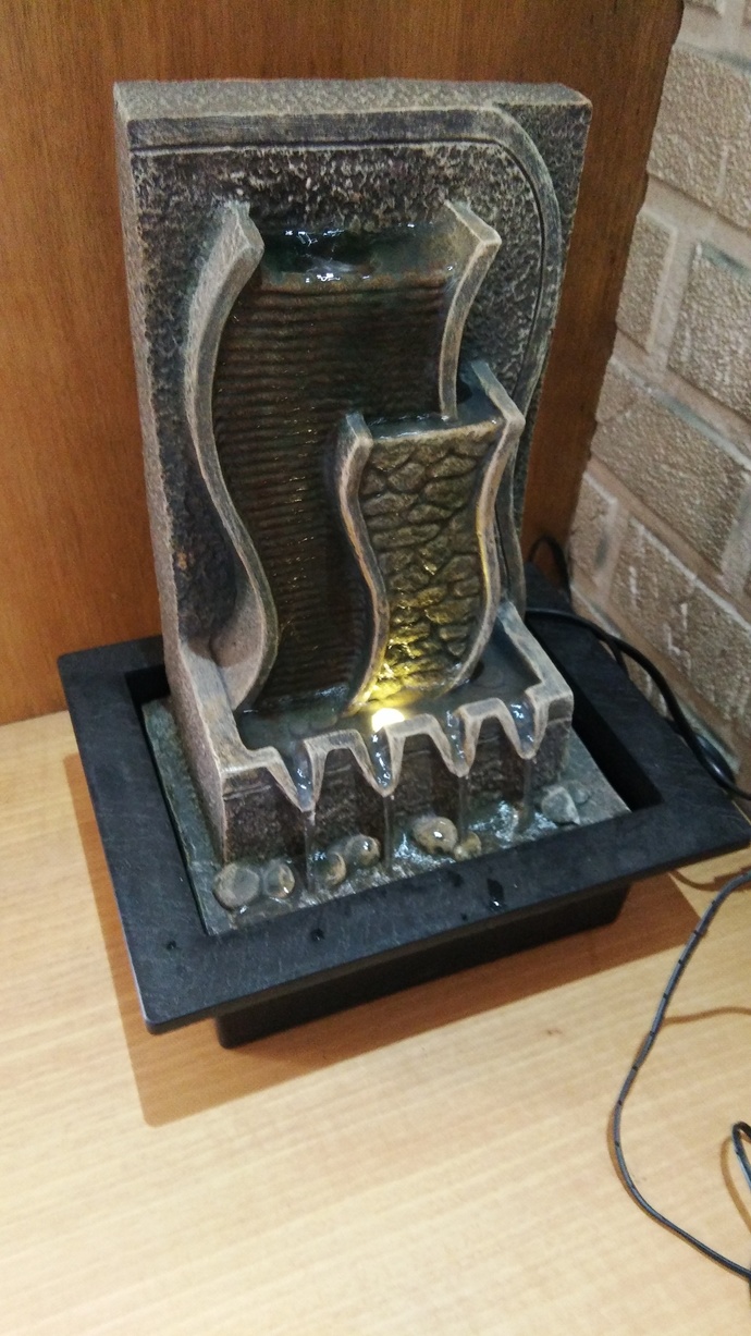 Small cute fountain for this piano table
