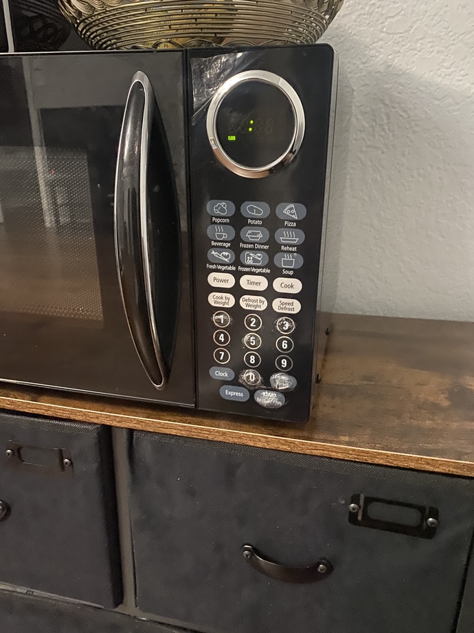 HELP WHAT MATERIAL IS SAFE TO USE UNDER A MOCRWAVE? IS THIS SAFE TO PUT UNDER MT MICROWAVE OR IS IT FLAMMABLE?