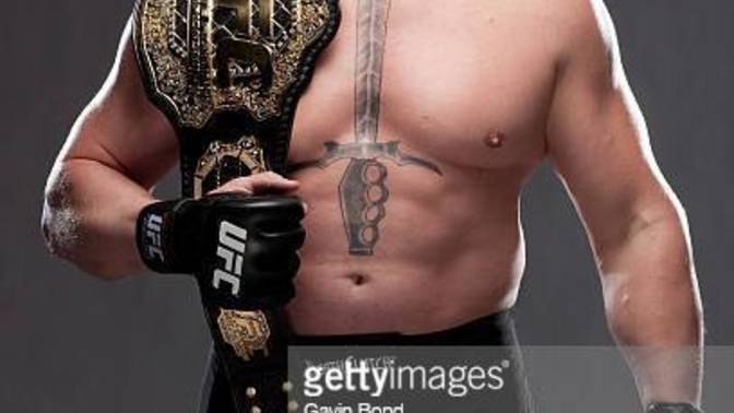 What comes a lot being the UFC heavyweight champion as the top fighter and contenders attempt to challenge you for it?