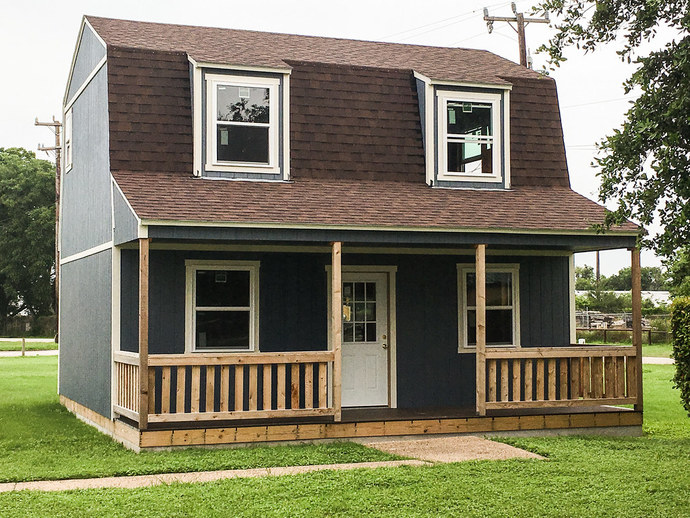 Due to how the economy is, is it best to save up for a house or get a shed house like in the pic and put it on a land and fix it up like you want?