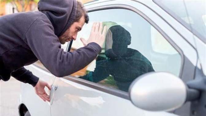 Someone is breaking into your vehicle, what do you do?