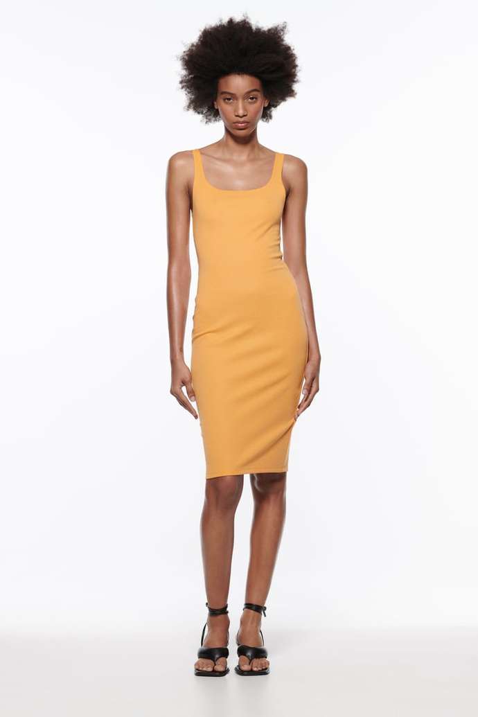 What color of this dress is more suitable for white hair and pale skin?