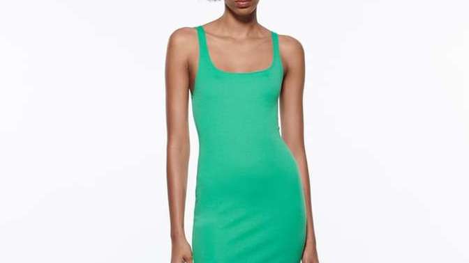 What color of this dress is more suitable for white hair and pale skin?