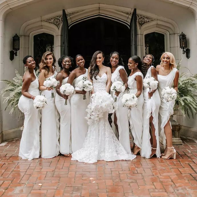 Bridesmaid wearing a white dress to a wedding?