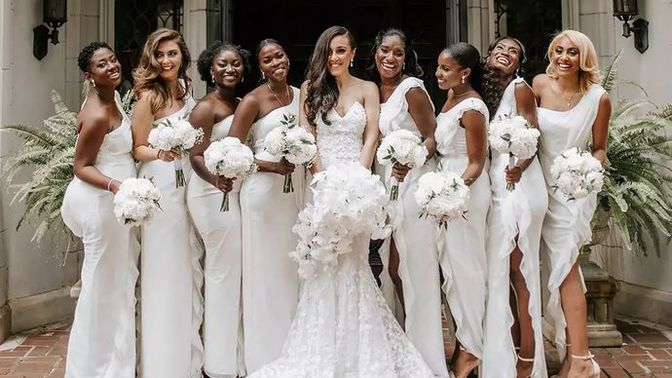 Bridesmaid wearing a white dress to a wedding?