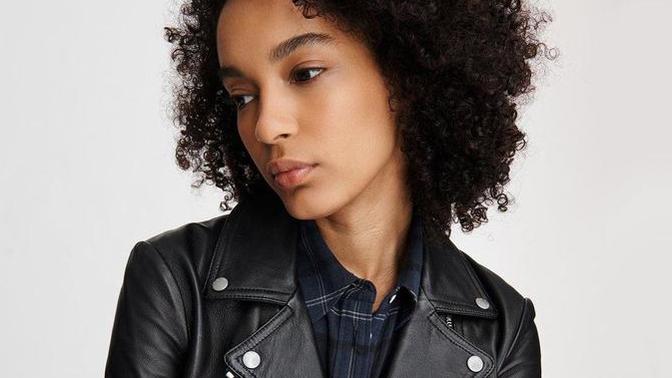 How do women live in the modern world while maintaining their femininity?