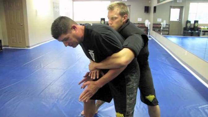 What’s the best way to escape a bear hug from an attacker?