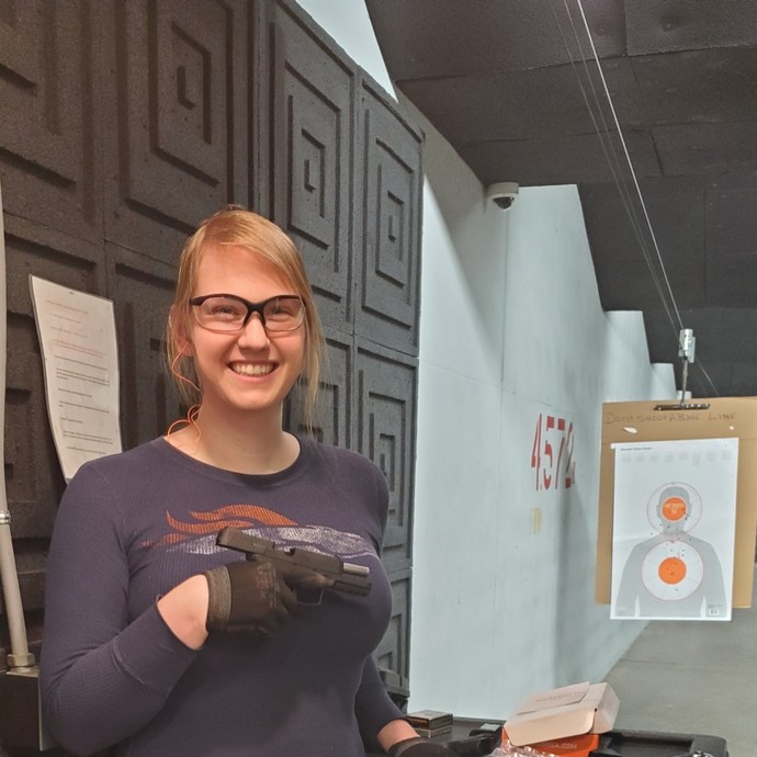 this look like a girl that is afraid of guns?