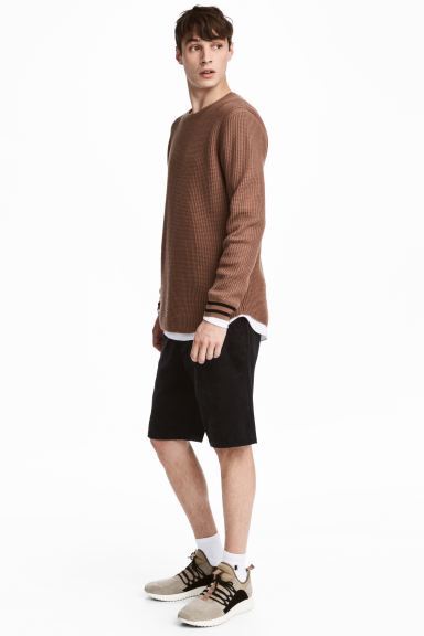 What’s the ideal length for men’s shorts?