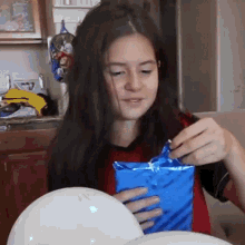 How do you like to open wrapped gifts to you?