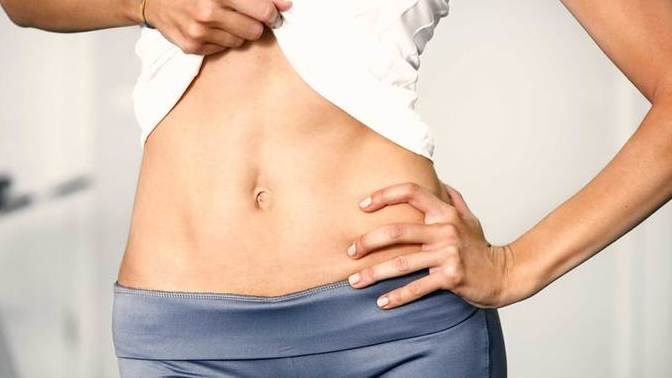 Should girls have a flat tummy or abs?