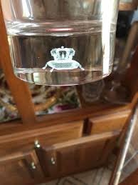 Is it weird that I have a whiskey cup that has a crown design on the inside?