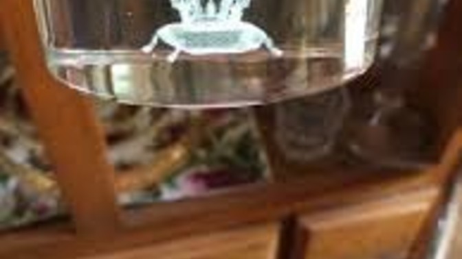 Is it weird that I have a whiskey cup that has a crown design on the inside?