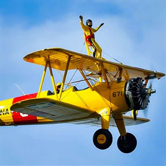 Do you travel "by plane" or "in a plane"?