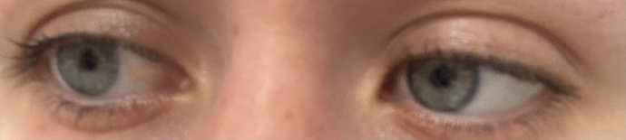 Do you think her eyes are blue or green?