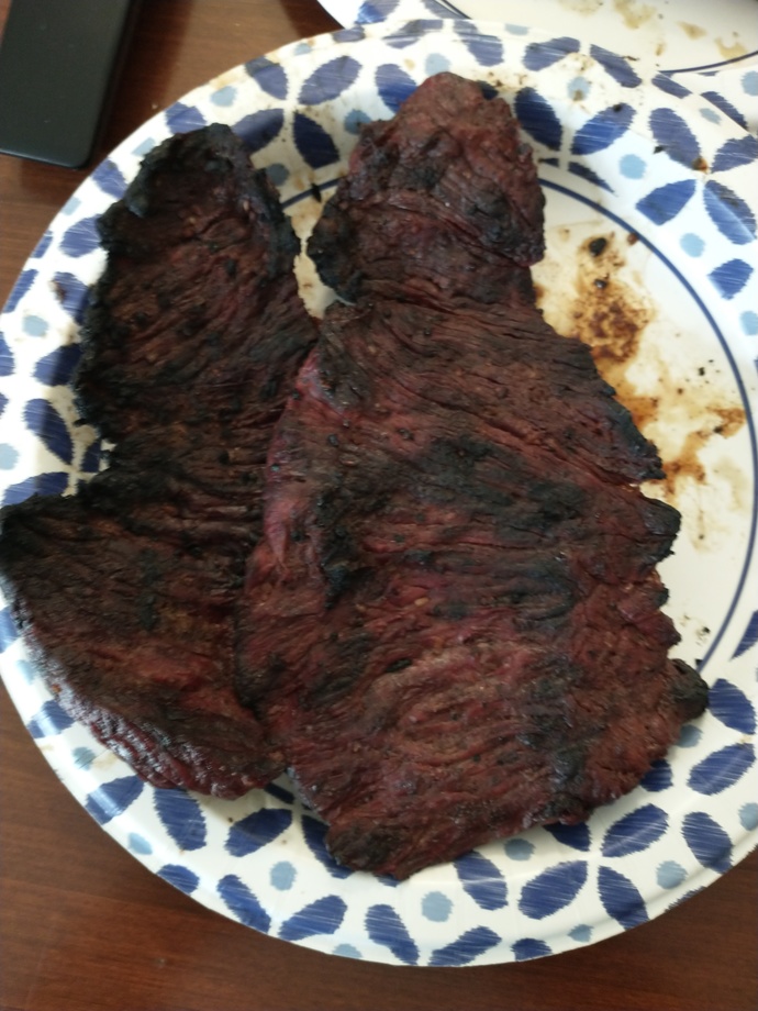 Is cooking meat on a grill a "man's job"?