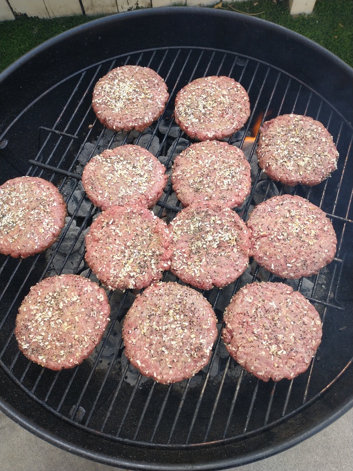Is cooking meat on a grill a "man's job"?