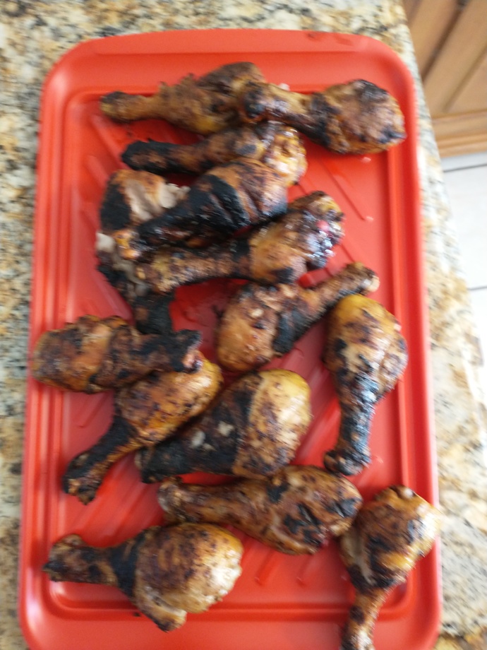 Is cooking meat on a grill a "man's job"?